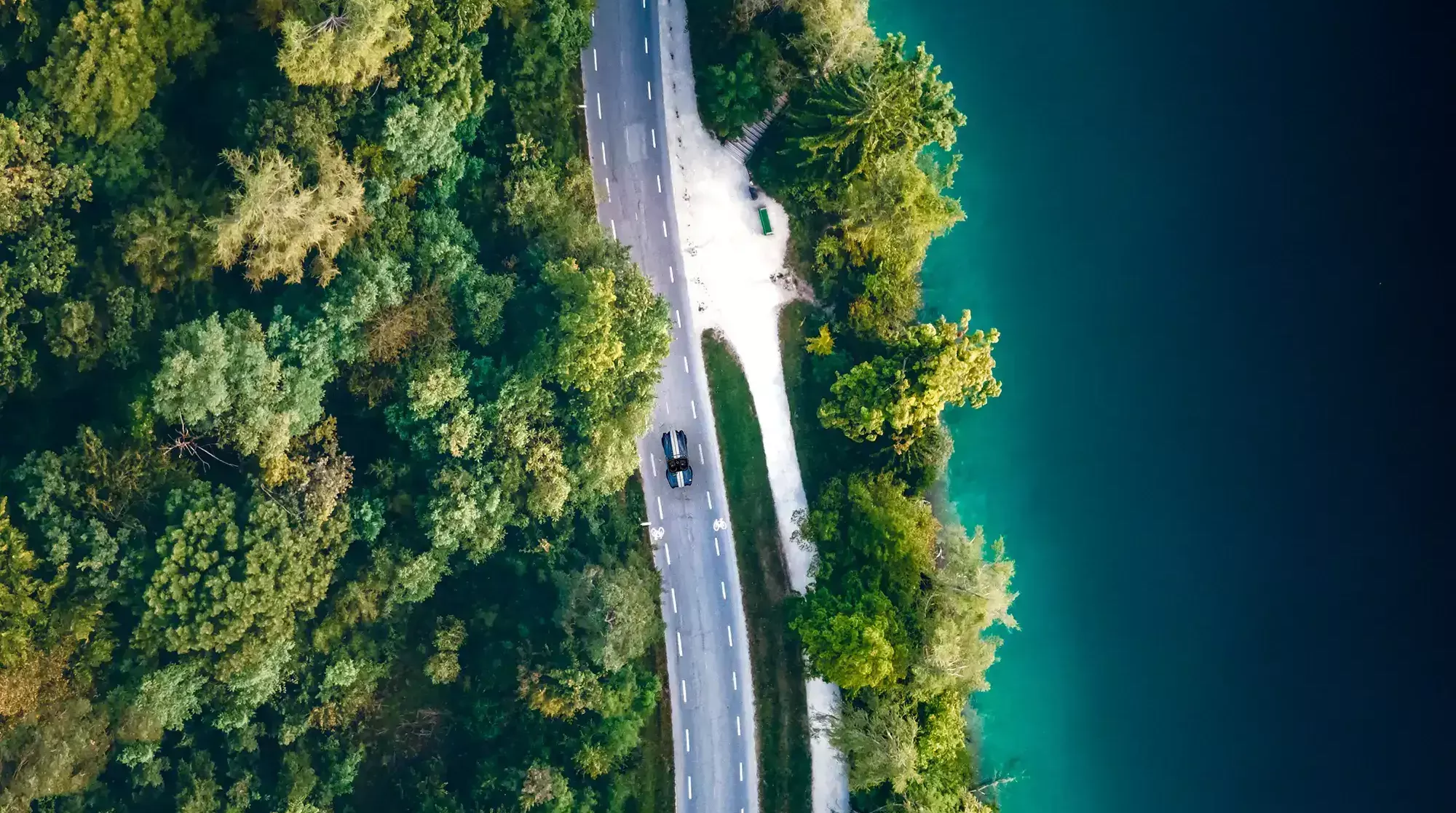 Aerial view of a road along shoreline in Lake Bled, Slovenia